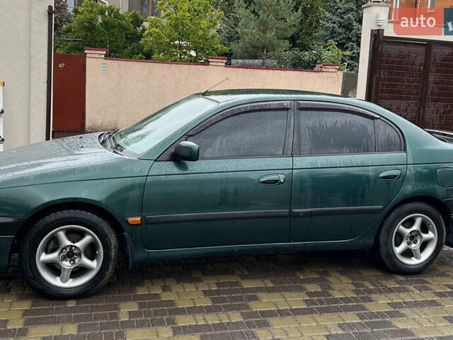 Зеленый Тойота Авенсис, объемом двигателя 1.8 л и пробегом 426 тыс. км за 3800 $, фото 1 на Automoto.ua