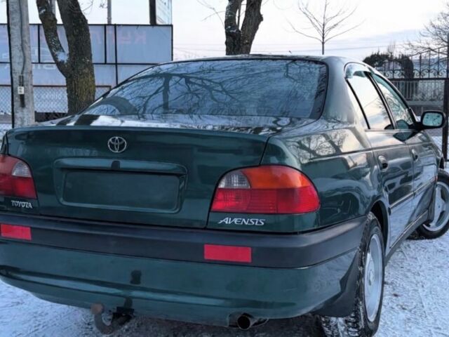 Зеленый Тойота Авенсис, объемом двигателя 2 л и пробегом 224 тыс. км за 3300 $, фото 1 на Automoto.ua