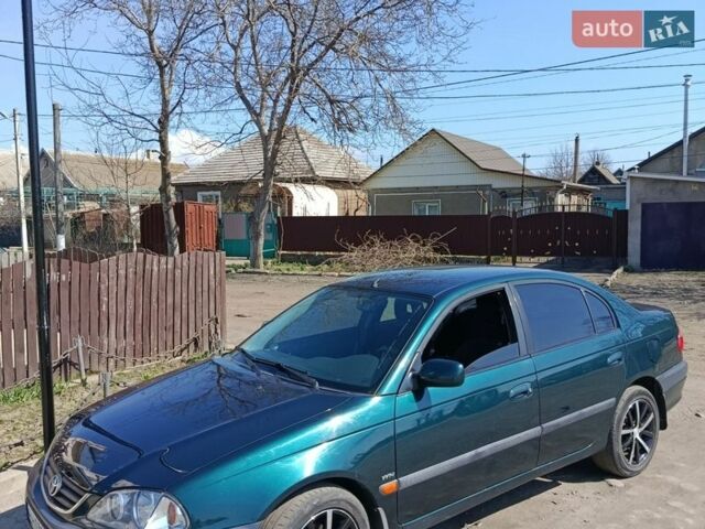 Зеленый Тойота Авенсис, объемом двигателя 1.79 л и пробегом 235 тыс. км за 3850 $, фото 1 на Automoto.ua