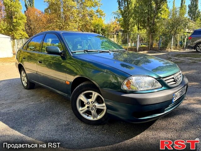 Зеленый Тойота Авенсис, объемом двигателя 2 л и пробегом 285 тыс. км за 3200 $, фото 1 на Automoto.ua