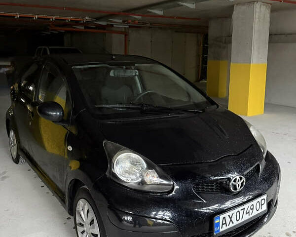 Чорний Тойота Айго, об'ємом двигуна 1 л та пробігом 167 тис. км за 6200 $, фото 1 на Automoto.ua