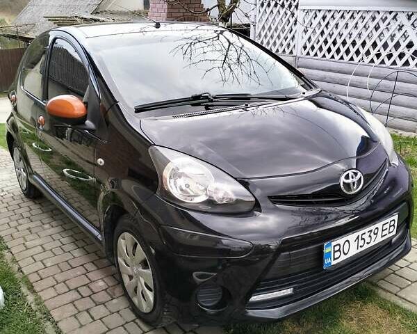 Черный Тойота Айго, объемом двигателя 0.9 л и пробегом 180 тыс. км за 6500 $, фото 1 на Automoto.ua