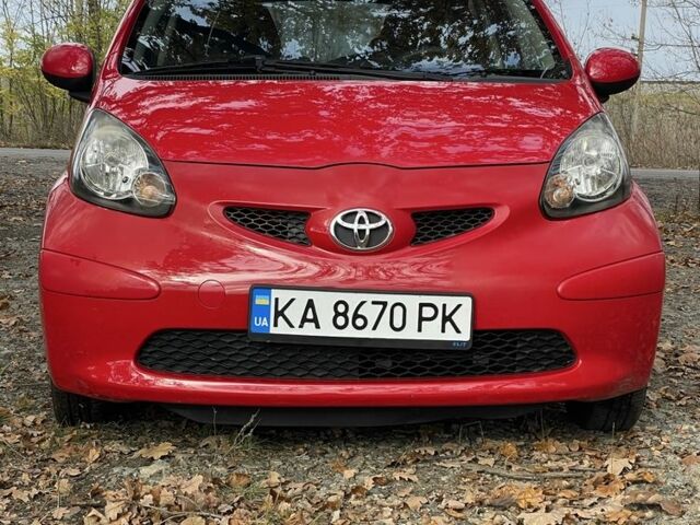 Красный Тойота Айго, объемом двигателя 1 л и пробегом 60 тыс. км за 3541 $, фото 1 на Automoto.ua