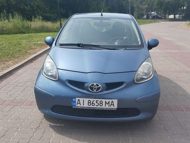 Синій Тойота Айго, об'ємом двигуна 1 л та пробігом 236 тис. км за 3800 $, фото 1 на Automoto.ua
