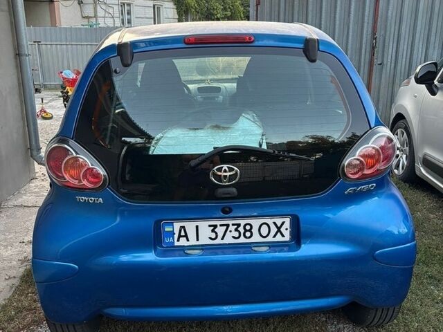 Синій Тойота Айго, об'ємом двигуна 1 л та пробігом 198 тис. км за 4500 $, фото 1 на Automoto.ua