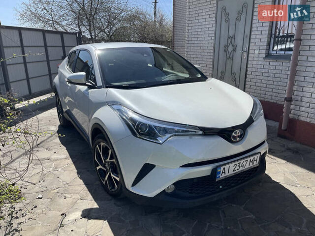 Белый Тойота C-HR, объемом двигателя 1.99 л и пробегом 23 тыс. км за 22500 $, фото 1 на Automoto.ua