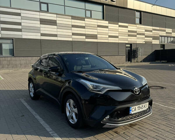 Черный Тойота C-HR, объемом двигателя 1.2 л и пробегом 142 тыс. км за 18000 $, фото 1 на Automoto.ua
