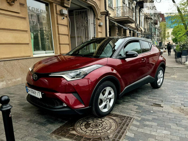 Красный Тойота C-HR, объемом двигателя 1.2 л и пробегом 27 тыс. км за 21000 $, фото 1 на Automoto.ua