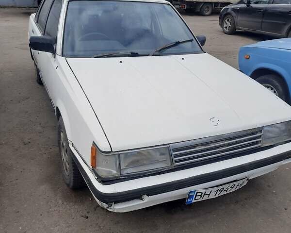 Белый Тойота Камри, объемом двигателя 1.8 л и пробегом 480 тыс. км за 1990 $, фото 1 на Automoto.ua