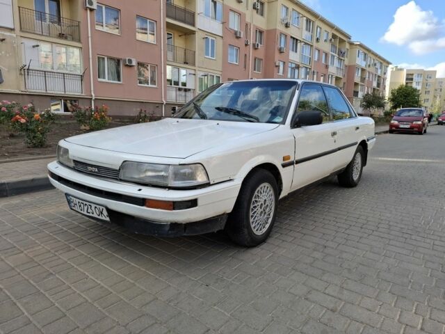 Белый Тойота Камри, объемом двигателя 2 л и пробегом 315 тыс. км за 1100 $, фото 1 на Automoto.ua