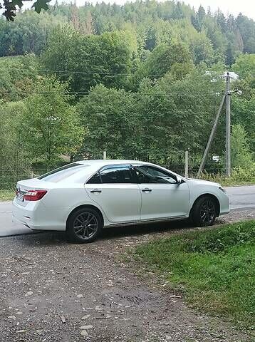 Білий Тойота Камрі, об'ємом двигуна 2.5 л та пробігом 210 тис. км за 14000 $, фото 1 на Automoto.ua