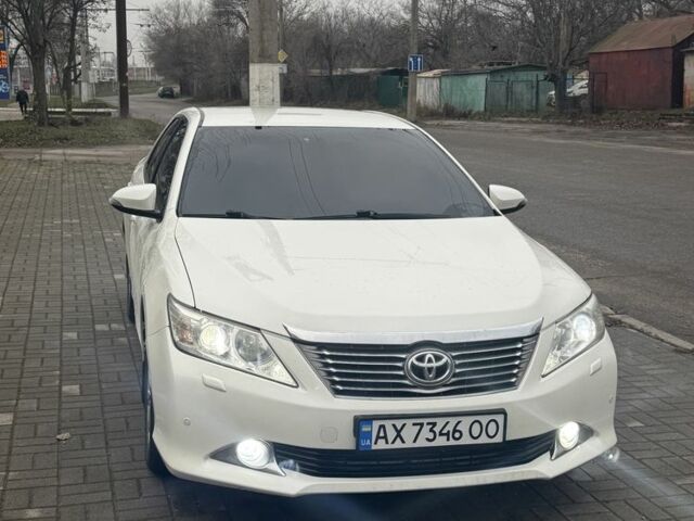 Белый Тойота Камри, объемом двигателя 2.5 л и пробегом 273 тыс. км за 12200 $, фото 1 на Automoto.ua