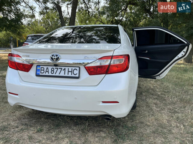 Білий Тойота Камрі, об'ємом двигуна 2.49 л та пробігом 234 тис. км за 12500 $, фото 1 на Automoto.ua