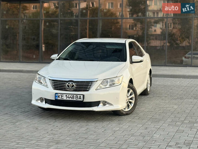 Белый Тойота Камри, объемом двигателя 2.5 л и пробегом 101 тыс. км за 14200 $, фото 1 на Automoto.ua