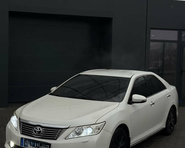 Белый Тойота Камри, объемом двигателя 2.5 л и пробегом 188 тыс. км за 14500 $, фото 1 на Automoto.ua
