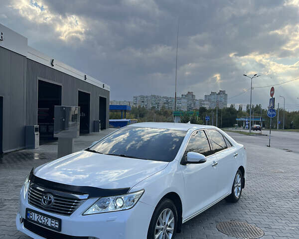 Белый Тойота Камри, объемом двигателя 2.5 л и пробегом 257 тыс. км за 14800 $, фото 1 на Automoto.ua