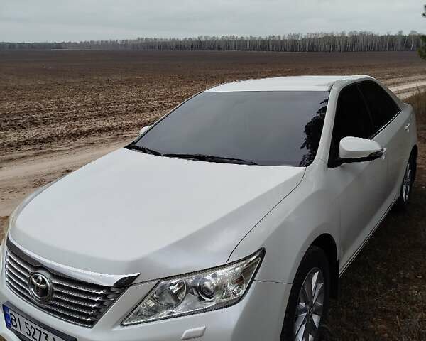 Білий Тойота Камрі, об'ємом двигуна 2.5 л та пробігом 196 тис. км за 11750 $, фото 1 на Automoto.ua