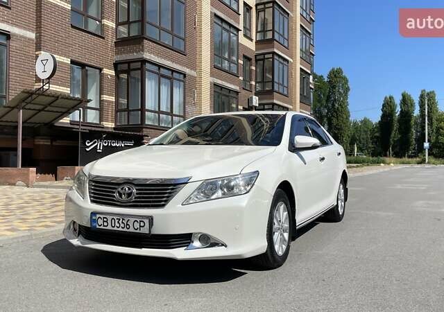 Белый Тойота Камри, объемом двигателя 2.49 л и пробегом 257 тыс. км за 12200 $, фото 1 на Automoto.ua