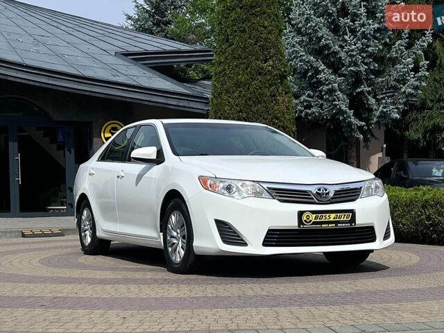 Белый Тойота Камри, объемом двигателя 2.49 л и пробегом 78 тыс. км за 15700 $, фото 1 на Automoto.ua