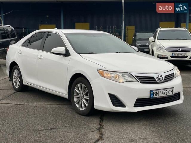 Білий Тойота Камрі, об'ємом двигуна 2.49 л та пробігом 252 тис. км за 8990 $, фото 1 на Automoto.ua