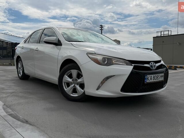 Белый Тойота Камри, объемом двигателя 2.5 л и пробегом 240 тыс. км за 12900 $, фото 1 на Automoto.ua
