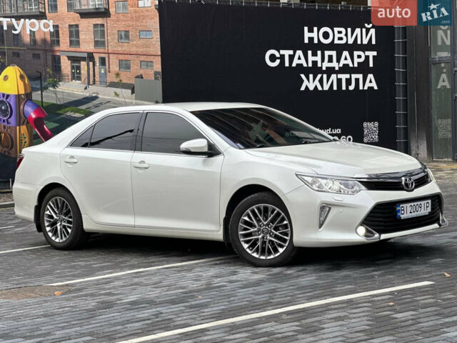 Білий Тойота Камрі, об'ємом двигуна 2.49 л та пробігом 155 тис. км за 17199 $, фото 1 на Automoto.ua