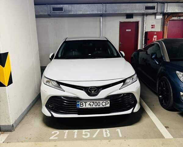 Білий Тойота Камрі, об'ємом двигуна 2.49 л та пробігом 113 тис. км за 23500 $, фото 1 на Automoto.ua