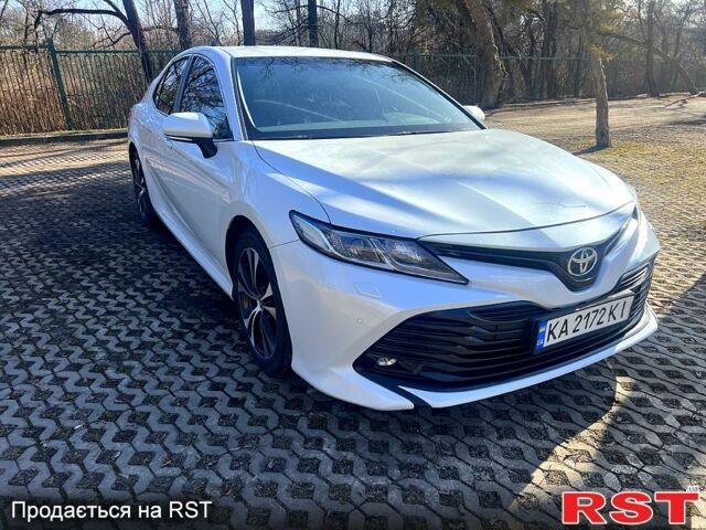 Белый Тойота Камри, объемом двигателя 2.5 л и пробегом 149 тыс. км за 19000 $, фото 1 на Automoto.ua