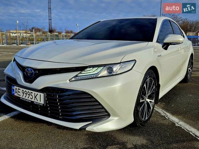 Белый Тойота Камри, объемом двигателя 2.49 л и пробегом 63 тыс. км за 23900 $, фото 1 на Automoto.ua