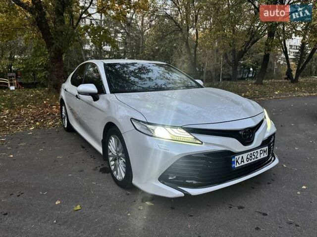 Белый Тойота Камри, объемом двигателя 2.49 л и пробегом 125 тыс. км за 25500 $, фото 1 на Automoto.ua