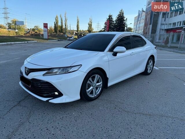 Белый Тойота Камри, объемом двигателя 2.5 л и пробегом 127 тыс. км за 18500 $, фото 1 на Automoto.ua