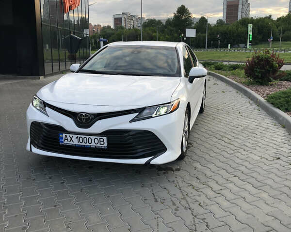 Білий Тойота Камрі, об'ємом двигуна 2.49 л та пробігом 132 тис. км за 16500 $, фото 1 на Automoto.ua