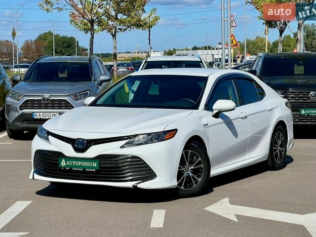 Белый Тойота Камри, объемом двигателя 2.49 л и пробегом 151 тыс. км за 23500 $, фото 1 на Automoto.ua