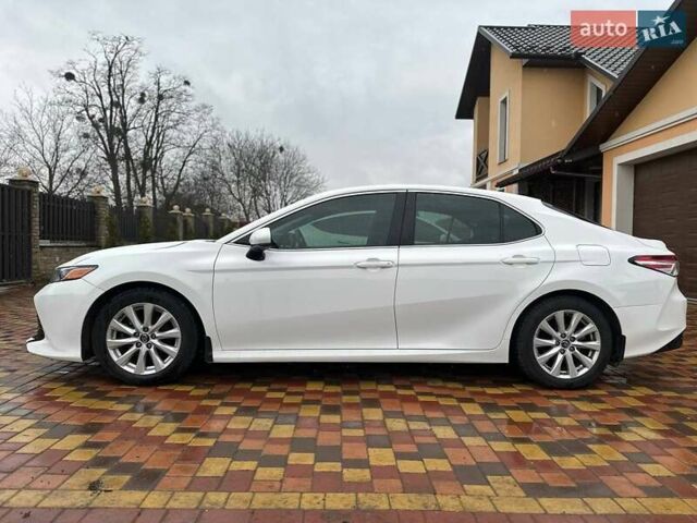 Білий Тойота Камрі, об'ємом двигуна 2.49 л та пробігом 110 тис. км за 20200 $, фото 1 на Automoto.ua