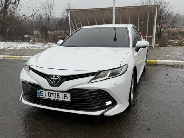 Белый Тойота Камри, объемом двигателя 2.5 л и пробегом 123 тыс. км за 20900 $, фото 1 на Automoto.ua