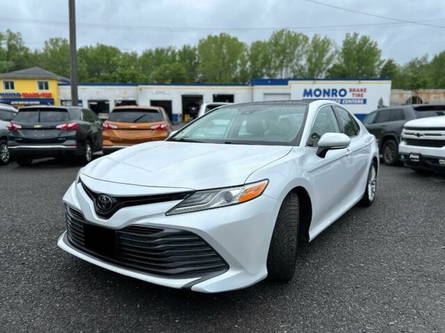 Білий Тойота Камрі, об'ємом двигуна 2.5 л та пробігом 66 тис. км за 16000 $, фото 1 на Automoto.ua