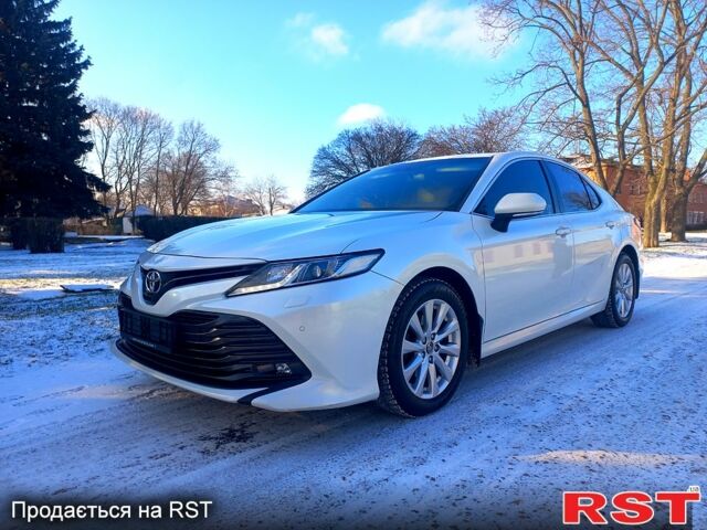 Белый Тойота Камри, объемом двигателя 2.5 л и пробегом 110 тыс. км за 23500 $, фото 1 на Automoto.ua