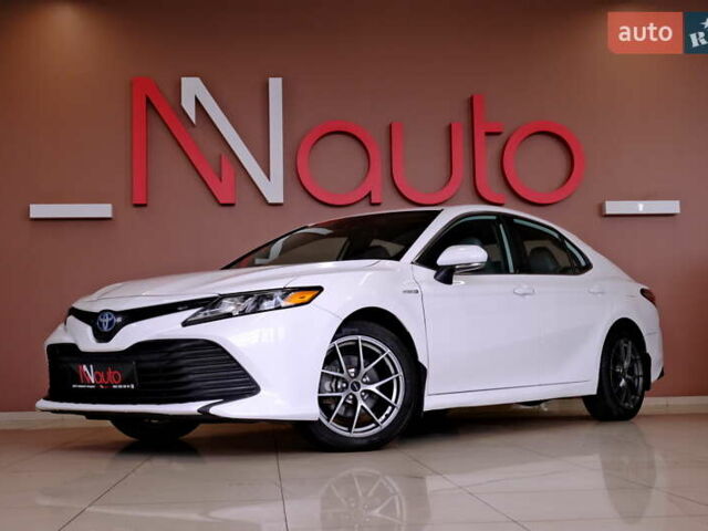 Белый Тойота Камри, объемом двигателя 2.5 л и пробегом 140 тыс. км за 21900 $, фото 1 на Automoto.ua