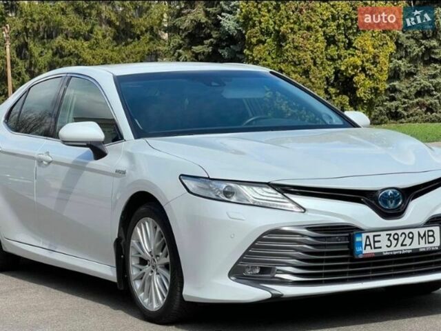 Белый Тойота Камри, объемом двигателя 2.5 л и пробегом 198 тыс. км за 24800 $, фото 1 на Automoto.ua