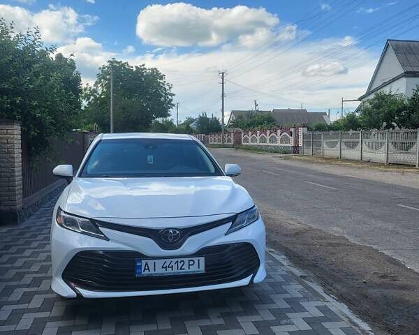 Білий Тойота Камрі, об'ємом двигуна 2.49 л та пробігом 150 тис. км за 20300 $, фото 1 на Automoto.ua