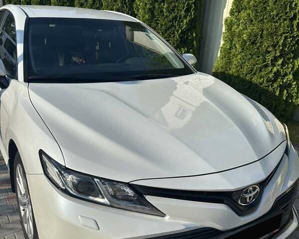 Білий Тойота Камрі, об'ємом двигуна 2.49 л та пробігом 133 тис. км за 23500 $, фото 1 на Automoto.ua