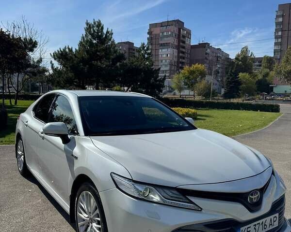 Белый Тойота Камри, объемом двигателя 2.49 л и пробегом 101 тыс. км за 28000 $, фото 1 на Automoto.ua