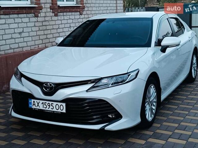 Белый Тойота Камри, объемом двигателя 2.49 л и пробегом 41 тыс. км за 24000 $, фото 1 на Automoto.ua