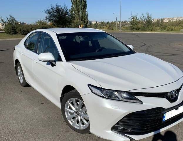 Белый Тойота Камри, объемом двигателя 2.5 л и пробегом 50 тыс. км за 28500 $, фото 1 на Automoto.ua