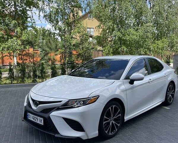Белый Тойота Камри, объемом двигателя 2.49 л и пробегом 80 тыс. км за 26200 $, фото 1 на Automoto.ua