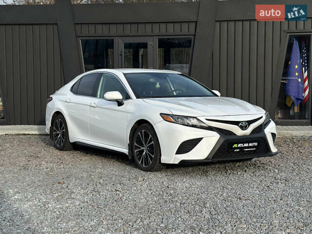 Білий Тойота Камрі, об'ємом двигуна 2.49 л та пробігом 112 тис. км за 21800 $, фото 1 на Automoto.ua