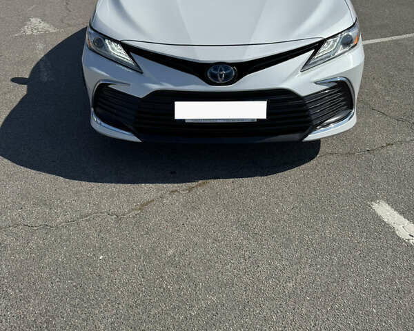 Белый Тойота Камри, объемом двигателя 2.49 л и пробегом 85 тыс. км за 28500 $, фото 1 на Automoto.ua