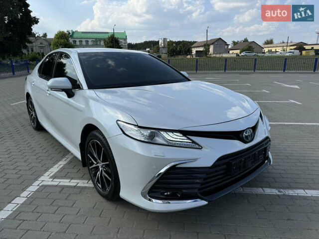 Белый Тойота Камри, объемом двигателя 2.49 л и пробегом 85 тыс. км за 30999 $, фото 1 на Automoto.ua