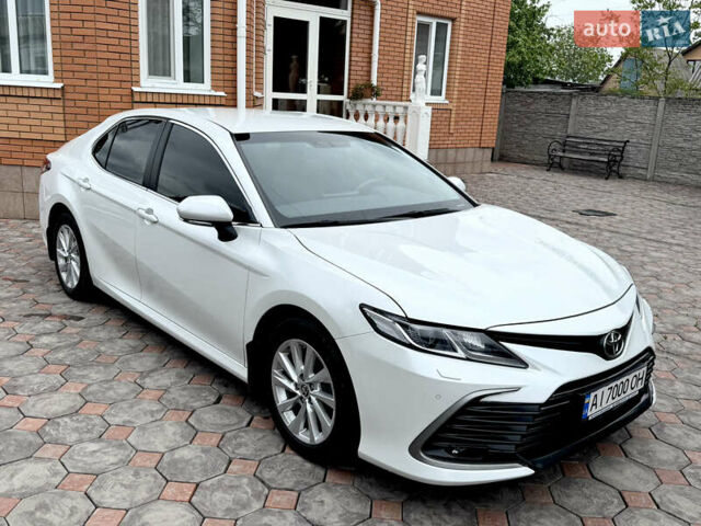 Білий Тойота Камрі, об'ємом двигуна 2.49 л та пробігом 105 тис. км за 26400 $, фото 1 на Automoto.ua