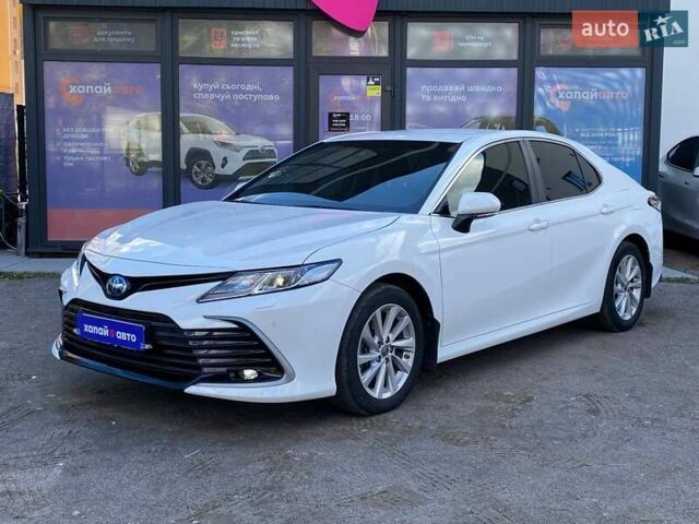 Белый Тойота Камри, объемом двигателя 2.49 л и пробегом 60 тыс. км за 36500 $, фото 1 на Automoto.ua
